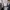 Two business men in suits, standing in front of grey back ground with gold CBRE and Turner & Townsend logo.